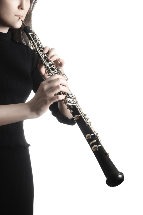 Oboe player. Hands playing woodwind musical instruments (Wird bei Klick vergrößert)